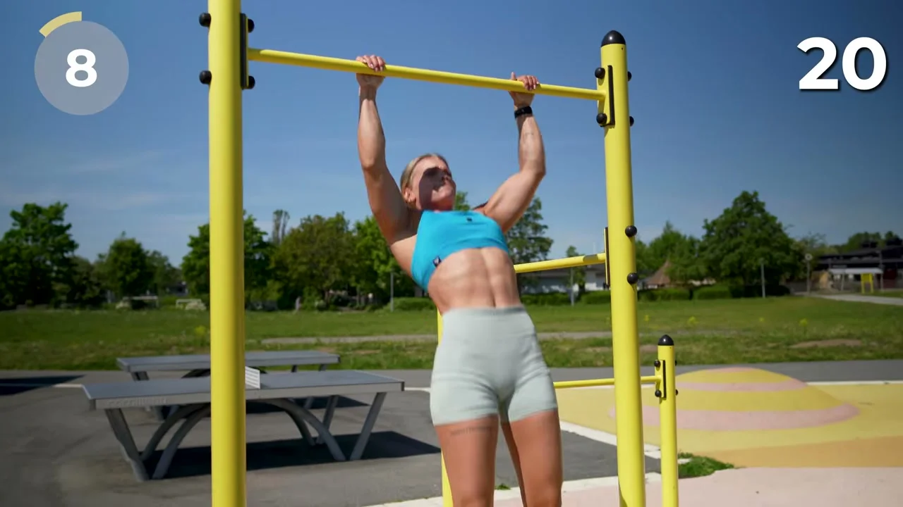 Malin performing pull-ups during the one minute max rep challenge