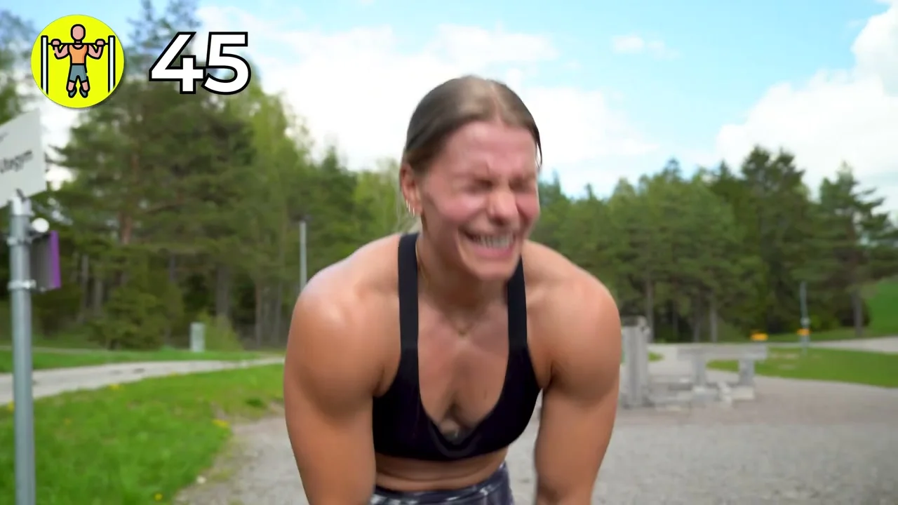 Malin Malle doing push-ups on the ground during the 100 push-up endurance challenge