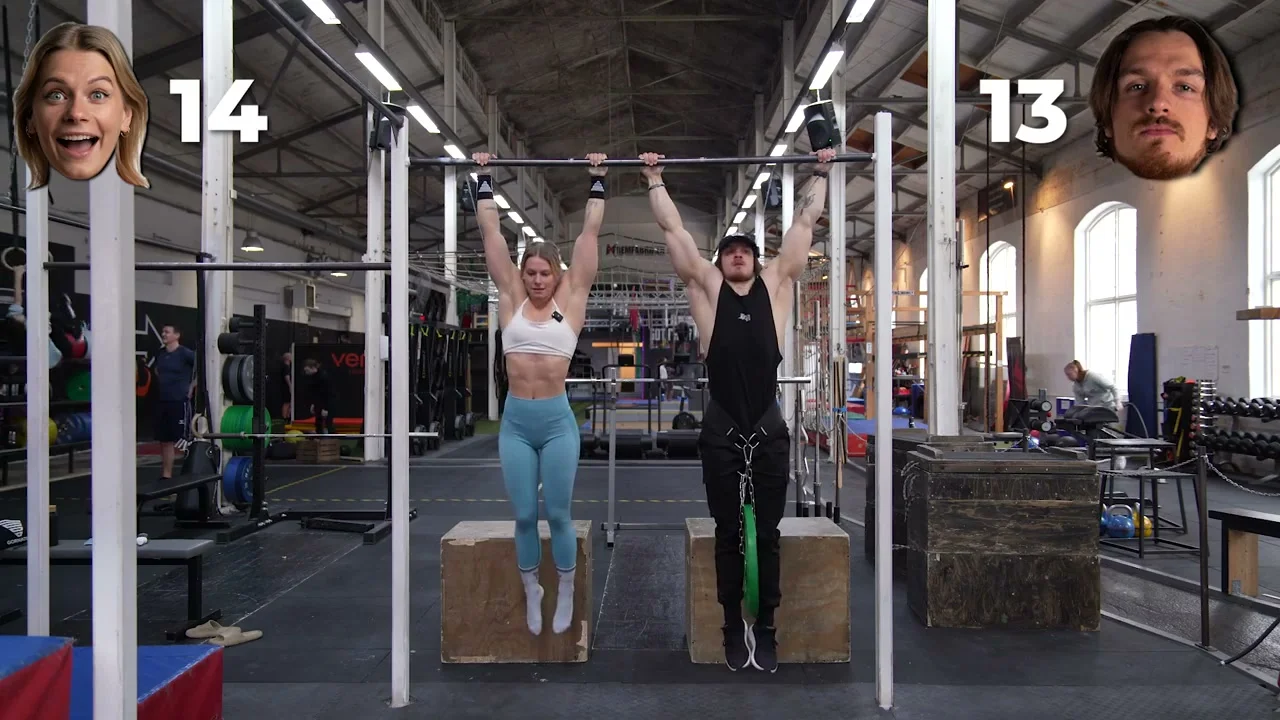 Malin and Bruno performing pull-ups side by side during the reps challenge
